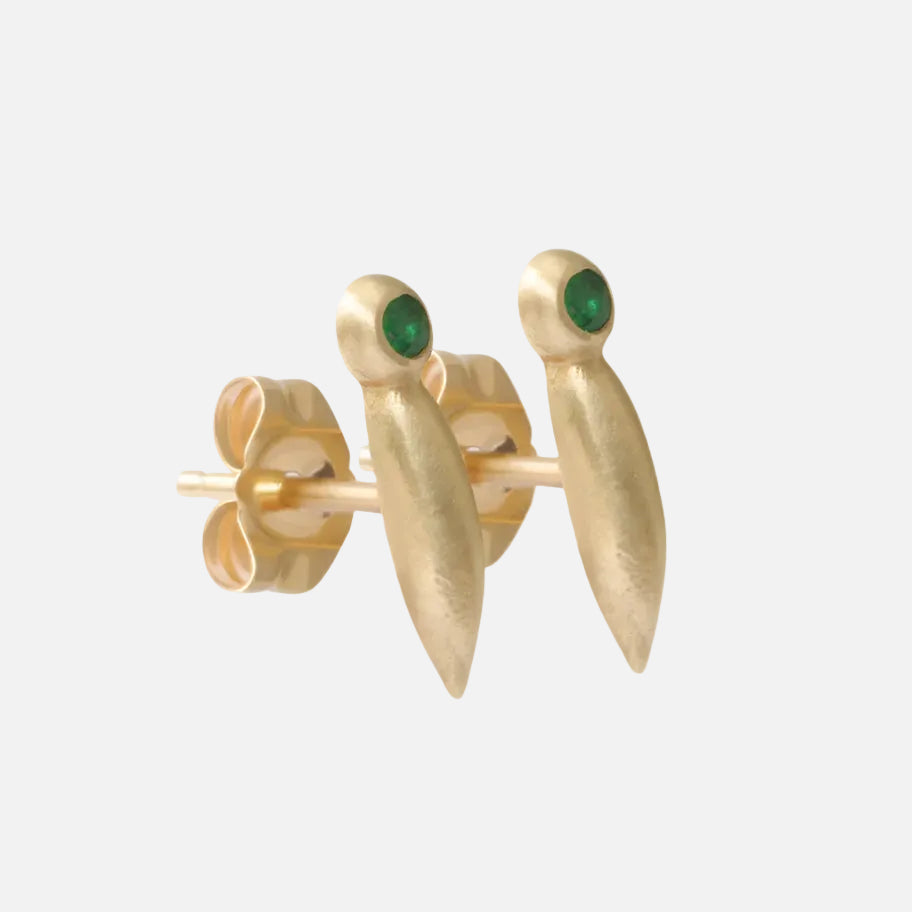 Introducing our stunning Emerald Earrings, featuring a captivating emerald stone in an elegant and timeless design. These versatile Emerald Earrings are perfect for any occasion. Two 1.5mm Round Emeralds 14k Yellow Gold Satin Finish Each stud measures 10.48mm height by 2.09mm width Sold as a pair