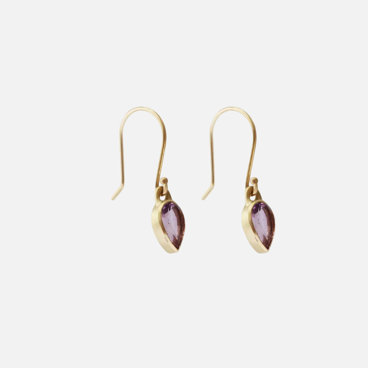 Details. Indulge in the timeless elegance of these single amethyst earrings. The stunning amethyst stones are beautifully showcased in an elegant and sophisticated design. Elevate any outfit with these exquisite earrings - a must-have addition to your jewelry collection. Tear shaped Amethysts Stone HxW: 20.79mm x 5.44mm 14k Yellow Gold Each earring measures 6.83mm x 4.69mm