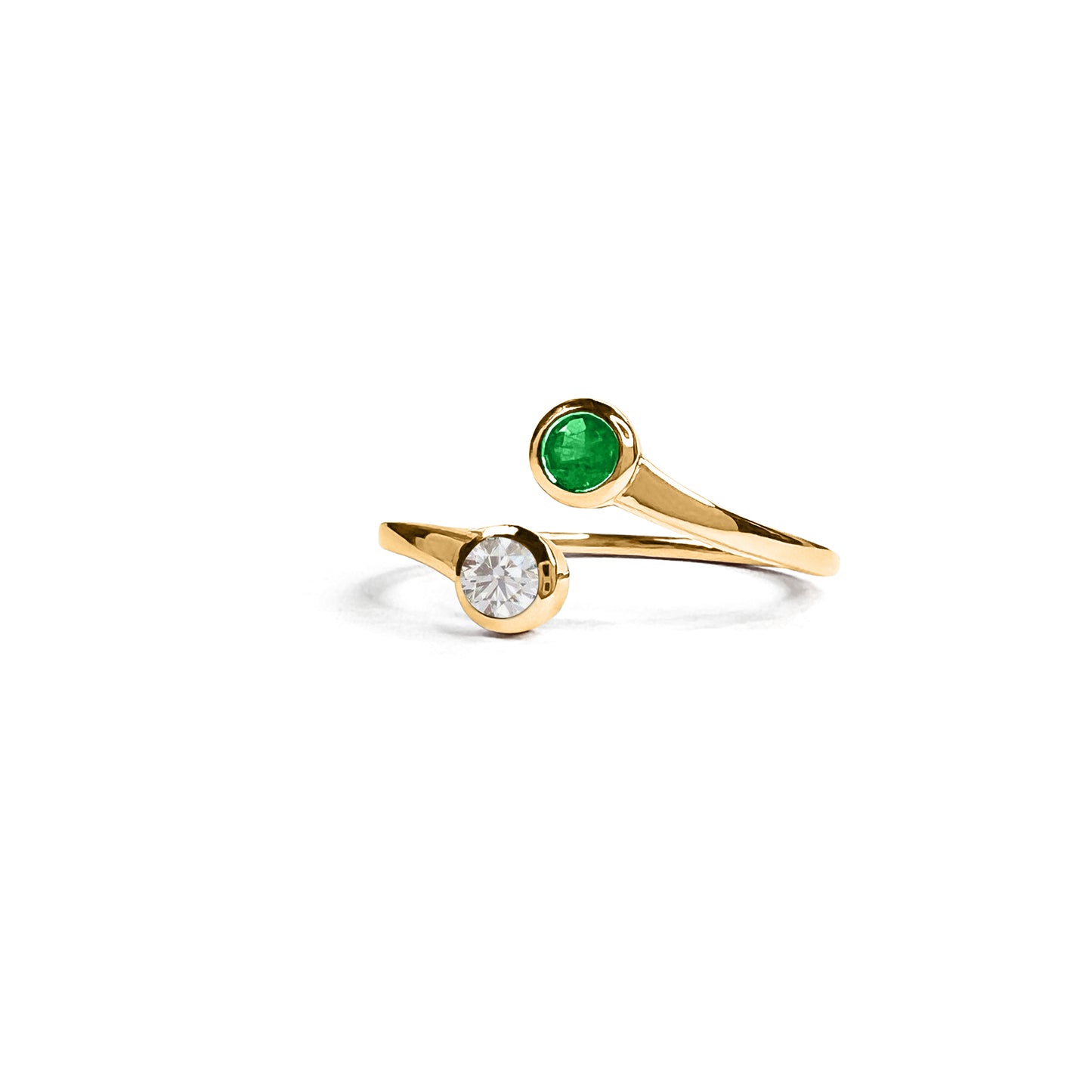 Details. Indulge in the exquisite beauty of this 14K Double Emerald and Diamond Ring. With its elegant design, stunning emerald stones, and sparkling diamond accents, this ring is sure to turn heads and make a statement. 2mm Band that tapers down to the bottom 1.5mm 4mm Diamond 4mm Emerald