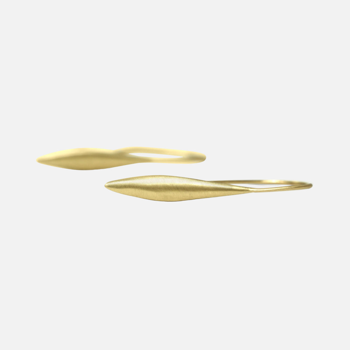Elegant style with these stunning 14K Long Pod Earrings these earrings are perfect for any occasion. Their versatile style makes them a must-have accessory for any jewelry collection. .