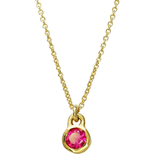 Indulge in the timeless elegance of our exquisite Ruby Necklace. Crafted with precision and attention to detail, this stunning piece showcases a precious gemstone that radiates beauty and luxury. Elevate your style with this symbol of sophistication and grace.- 4mm     2.5mm Round Ruby 16" Chain 14k Yellow Gold Satin Finish Pendant measures 5.94mm height by 4.20mm width