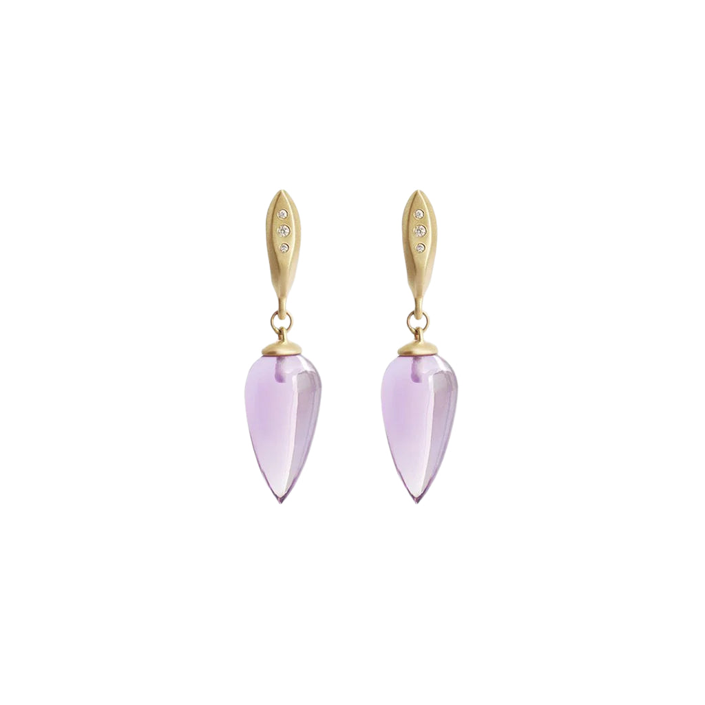 The Amethyst Drops with Diamonds are a Classic earring with a modern touch. A single polished Amethyst teardrop hangs from a hand formed earring with 3 gorgeous Ethically sourced Diamonds. Details 19mm Tear shaped Amethysts 6 White Diamonds 0.03ct 14k Yellow Gold Each earring measures 9.3mm width by 37mm length butterfly back