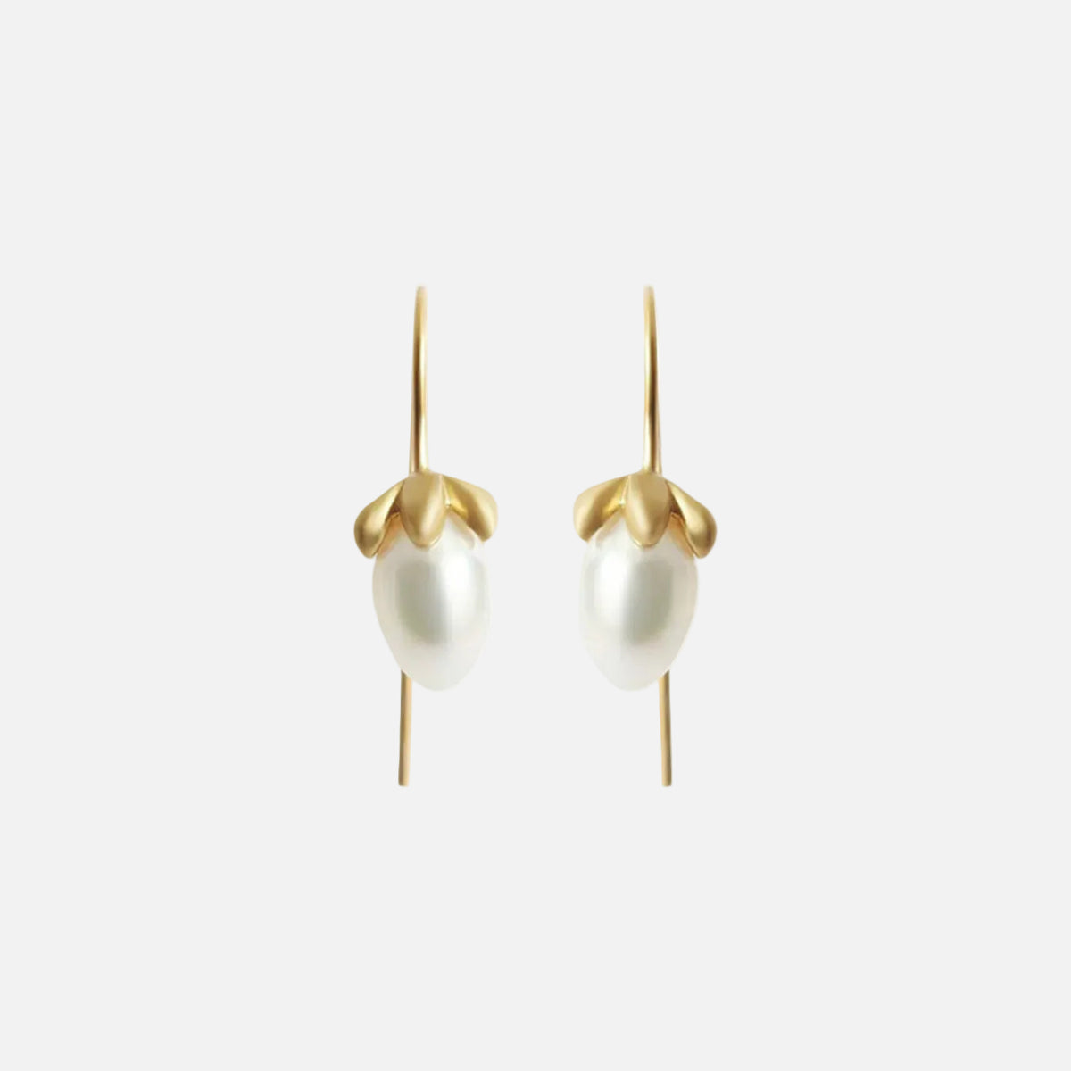 Handmade earring wires to compliment this beautiful classic pearl earrings. perfect for celebrating special moments and adding glamour to you day. Details 2 x 5mm Egg Shaped Pearls 14k Yellow Gold Satin Finish Each earring measures 5.9mm width by 10.5mm length