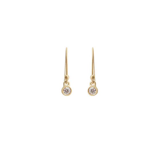 Dainty delicate Diamond drops.  Crafted with sparkling diamonds and featuring a dainty drop design, these earrings are the perfect accessory to add a touch of sophistication to any outfit. Elevate your style and make a statement with our exquisite Diamond Drop Earrings.  Details  2 x 3mm White Diamonds 14k Yellow Gold Satin Finish HxW: 20.05mm x 4.1mm