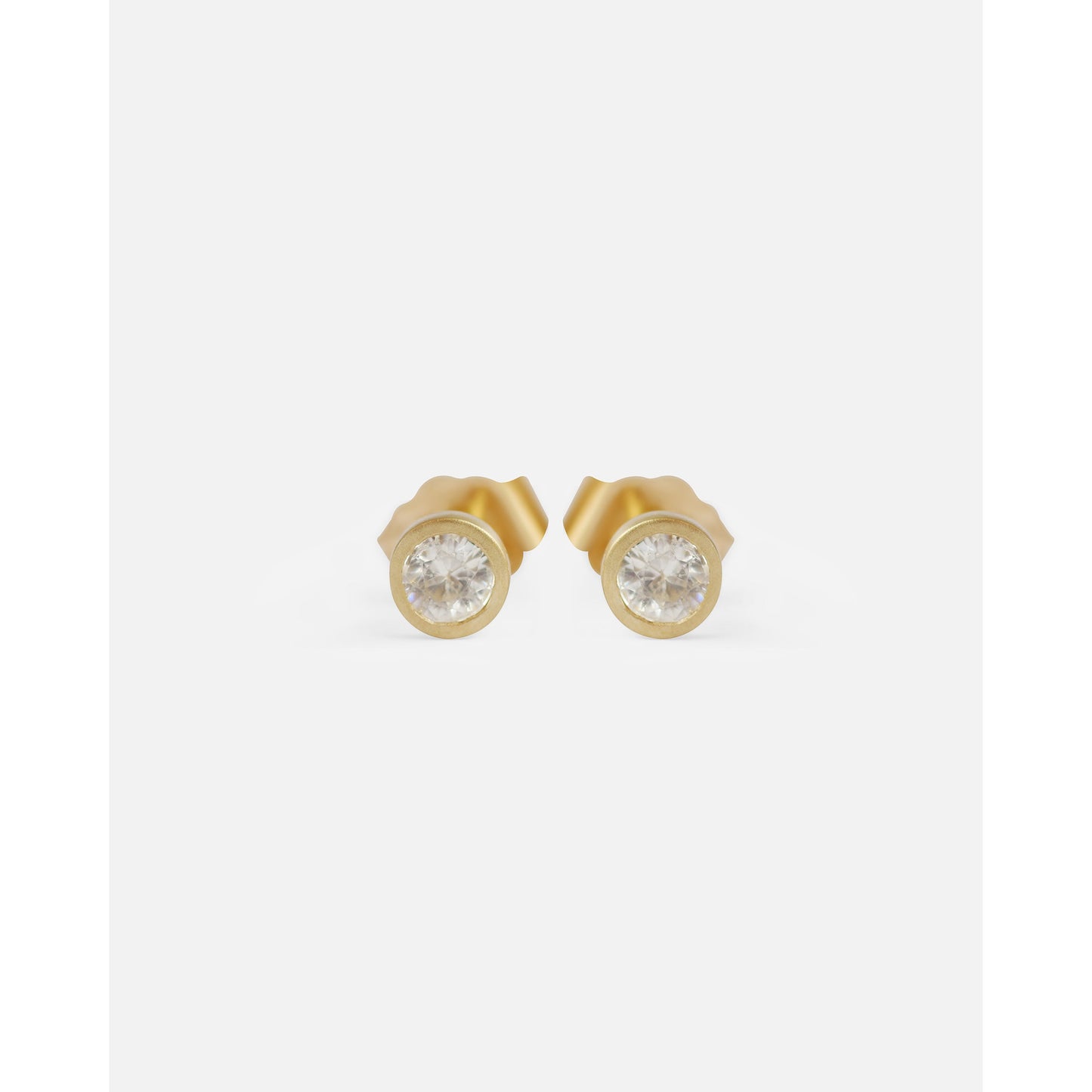 Details. Indulge in the captivating allure of these 3MM diamond studs. With their sparkling brilliance and timeless elegance, these versatile studs are the perfect accessory to elevate any outfit. Add a touch of luxury to your collection 2 x 3mm Round White Diamond 14k Yellow Gold Each earring measures 4.1mm x 4.15mm butterfly backs Satin Finished or Perfectly polished to a brilliant shine and perfection Beautifully Packaged And Shipped In A Jewelry Gift Box
