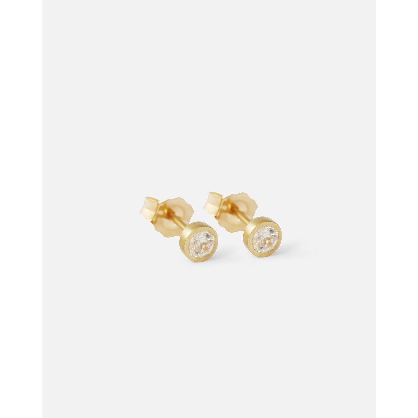 Details. Indulge in the captivating allure of these 3MM diamond studs. With their sparkling brilliance and timeless elegance, these versatile studs are the perfect accessory to elevate any outfit. Add a touch of luxury to your collection 2 x 3mm Round White Diamond 14k Yellow Gold Each earring measures 4.1mm x 4.15mm butterfly backs Satin Finished or Perfectly polished to a brilliant shine and perfection Beautifully Packaged And Shipped In A Jewelry Gift Box