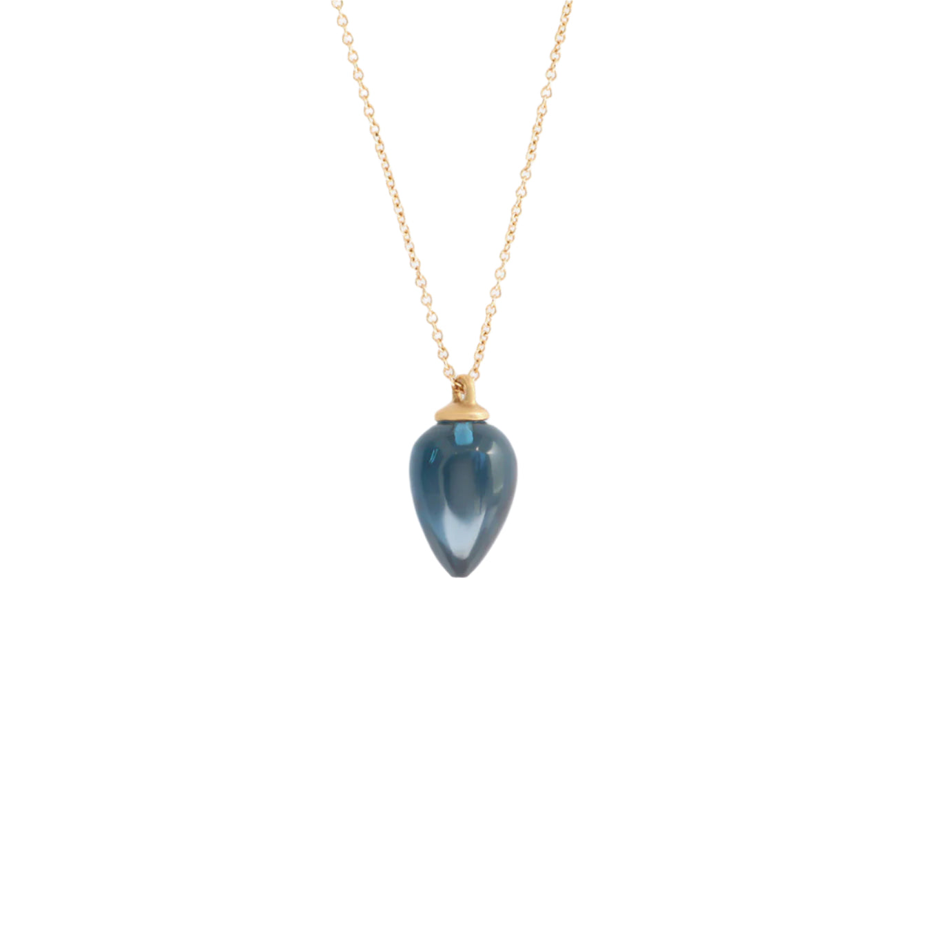 Adorn yourself with the breathtaking beauty of London Blue Topaz. This elegant necklace showcases the stunning blue gemstone w  Pear Shaped Blue Topaz Stone HxW: 13.8mm x 9.05mm 18" Chain 14k Yellow Gold Polished Finish
