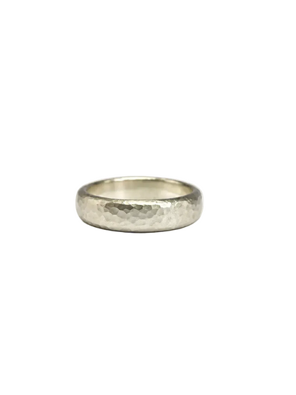 A hammered men’s ring with a distinctive textured finish.