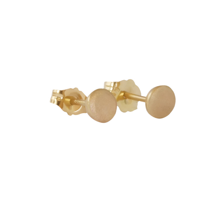  DOT /STUD EARRINGS. With their classic design and easy-to-wear style, these earrings are a must-have accessory for any occasion. 