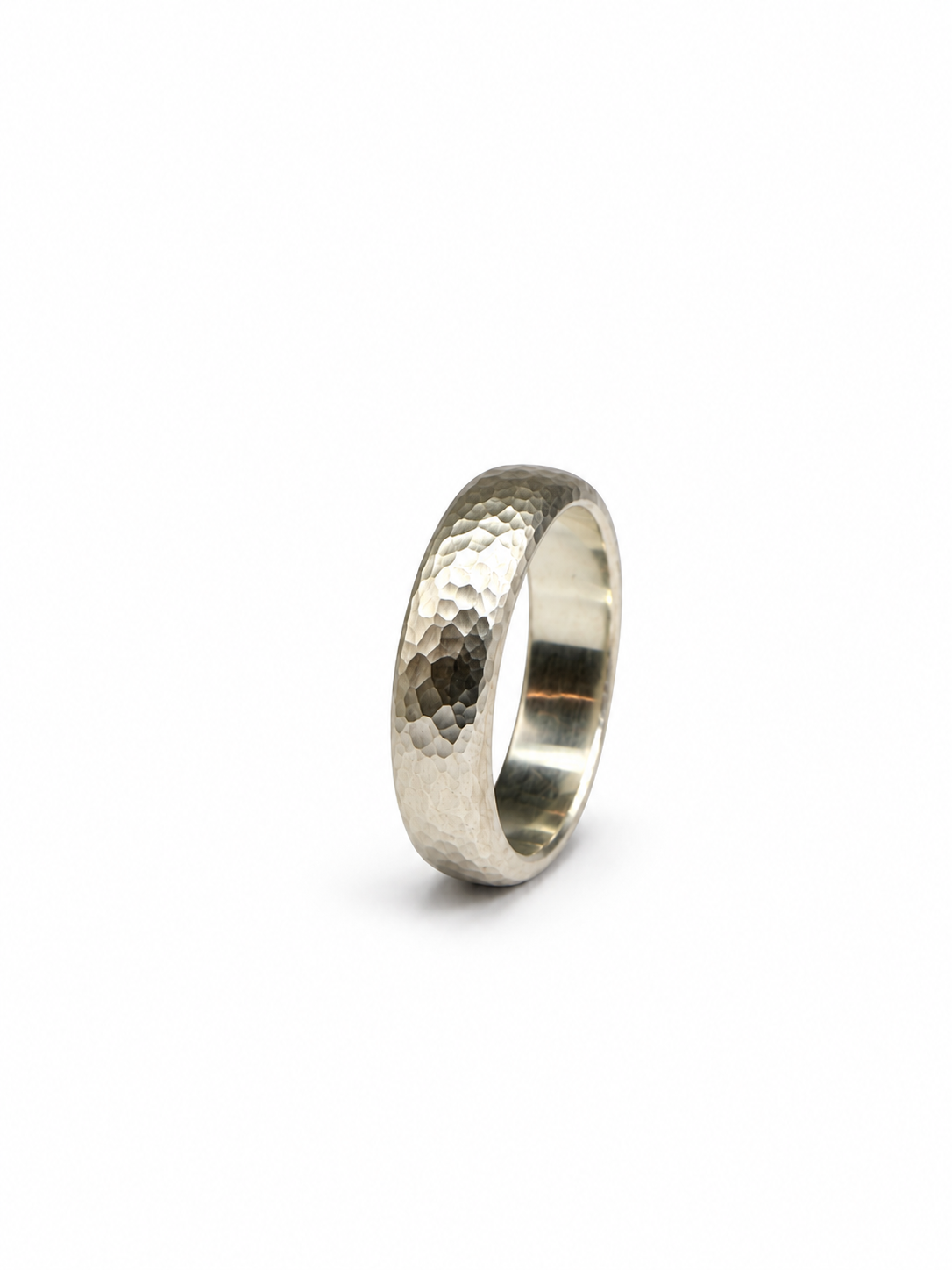 A hammered men’s ring with a distinctive textured finish.