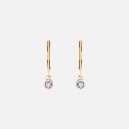 Indulge in the exquisite beauty of tanzanite with these stunning earrings. Crafted with elegance and sophistication, these earrings showcase the mesmerizing allure of tanzanite gemstones, making them the perfect accessory for any special occasion.  3mm Tanzanite 14k Yellow Gold Each earring measures 4mm width by 4.2mm length French Backs