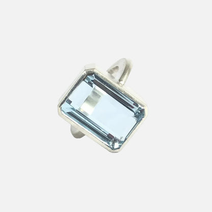 Add a touch of elegance to any outfit with this stunning Bright Blue Topaz Cocktail Ring. The vibrant blue color of the topaz stone is sure to catch everyone's eye, and the elegant cocktail design adds a sophisticated touch. Treat yourself or someone special to this eye-catching ring today!  16mm x 12mm Blue Topaz.