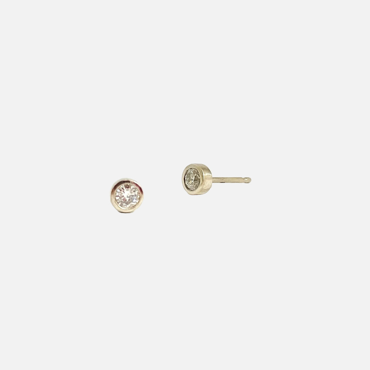 Details.  Indulge in the captivating allure of these 3MM diamond studs. With their sparkling brilliance and timeless elegance, these versatile studs are the perfect accessory to elevate any outfit. Add a touch of luxury to your collection  2 x 3mm Round White Diamond 14k Yellow Gold Each earring measures 4.1mm x 4.15mm butterfly backs Satin Finished or Perfectly polished to a brilliant shine and perfection Beautifully Packaged And Shipped In A Jewelry Gift Box