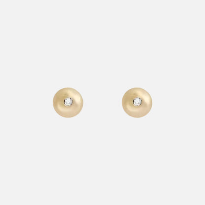 Add a touch of elegance to your everyday look with these stunning Dainty Ball Diamond Stud Earrings. Classic ball studs, with a Diamond they are  comfortable and Essential. Great for 2nd and 3rd ear piercings and cartilage earrings.   Details  2 x 1.5mm diamond 14k Yellow Gold W x T 3.5mm x 3.5mm