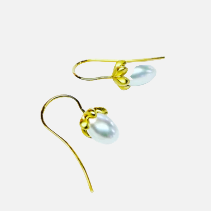 Handmade earring wires to compliment this beautiful classic pearl earrings.  perfect for celebrating special moments and adding glamour to you day.  Details  2 x 5mm Egg Shaped Pearls 14k Yellow Gold Satin Finish Each earring measures 5.9mm width by 10.5mm length