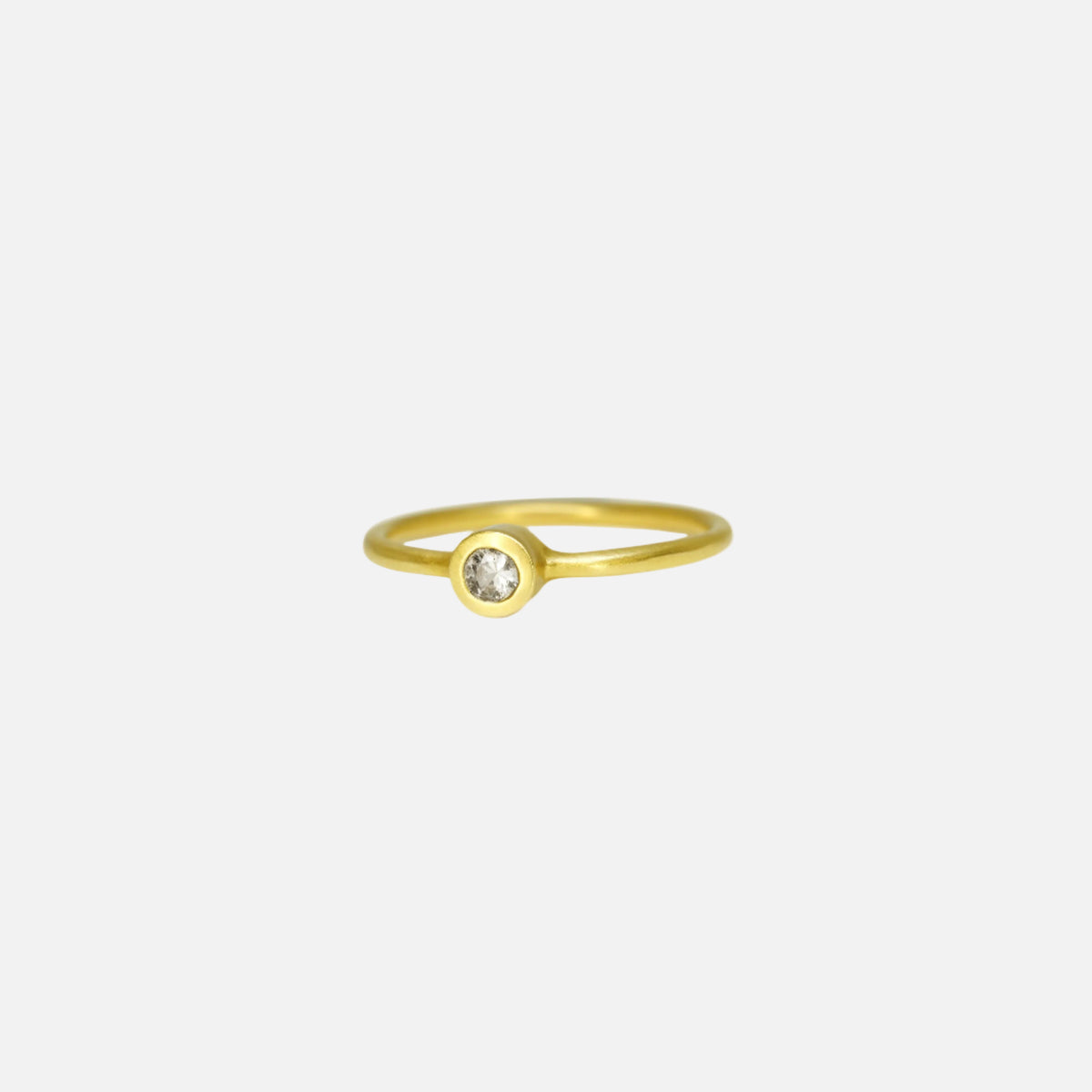 Details  Indulge in the timeless elegance of our Single Diamond Ring. This sparkling centerpiece features exquisite craftsmanship that will captivate your heart and dazzle on your finger. Elevate your style and make a statement with this stunning piece of jewelry.  3mm Round White Diamond Round Band 14k Yellow Gold Satin Finish WxT: 1.45mm