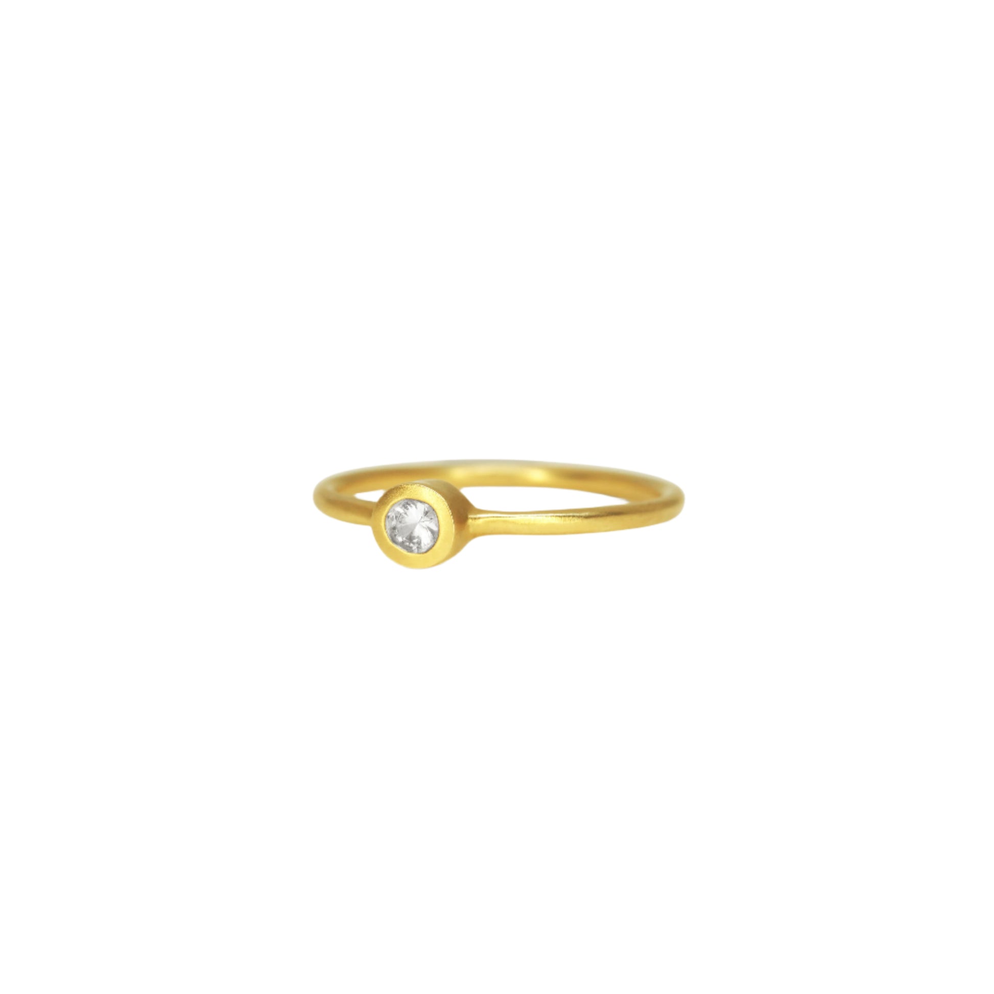 Details  Indulge in the timeless elegance of our Single Diamond Ring. This sparkling centerpiece features exquisite craftsmanship that will captivate your heart and dazzle on your finger. Elevate your style and make a statement with this stunning piece of jewelry.  3mm Round White Diamond Round Band 14k Yellow Gold Satin Finish WxT: 1.45mm