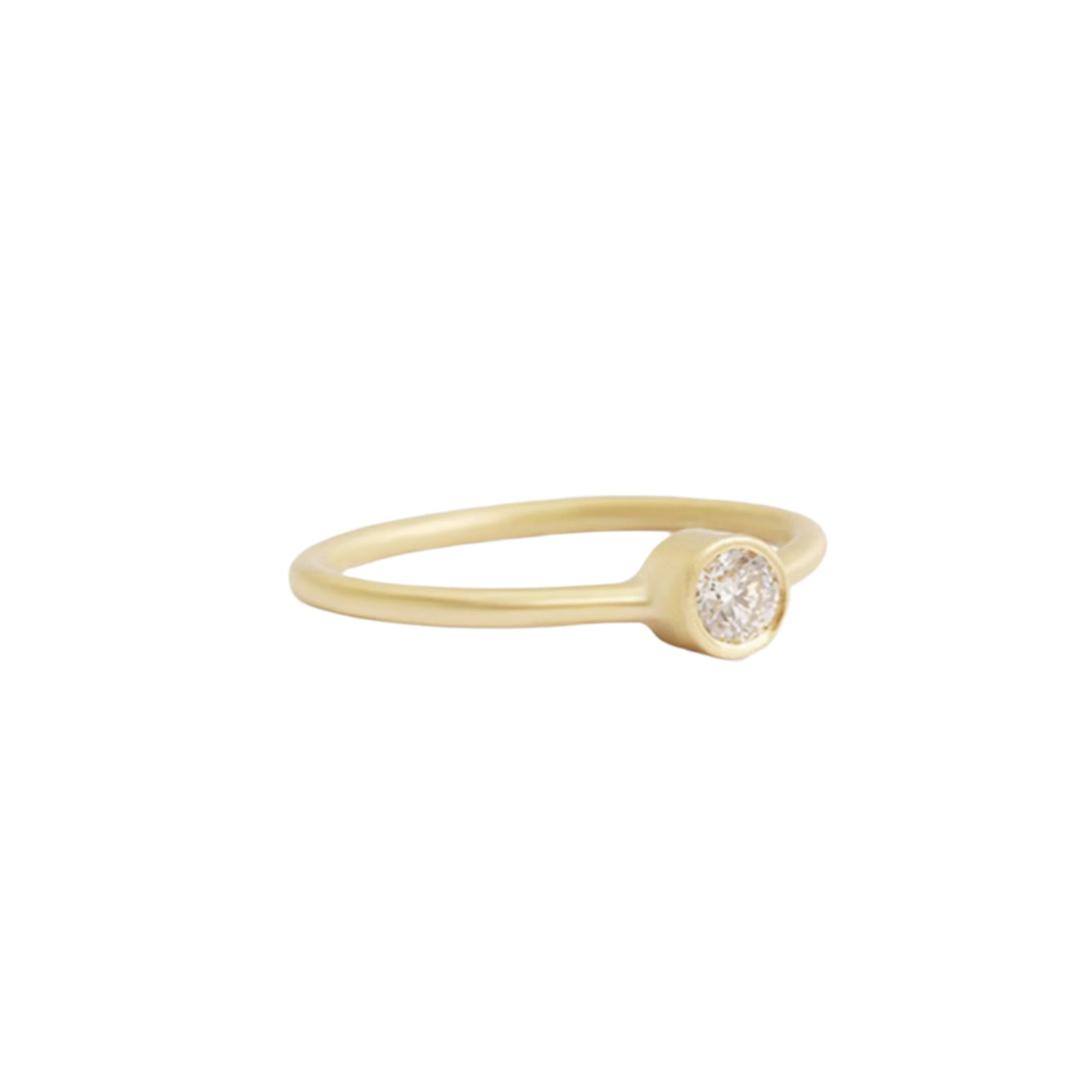 Indulge in the timeless elegance of our Single Diamond Ring. This sparkling centerpiece features exquisite craftsmanship that will captivate your heart and dazzle on your finger. Elevate your style and make a statement with this stunning piece of jewelry.  3mm Round White Diamond Round Band 14k Yellow Gold Satin Finish WxT: 1.45mm