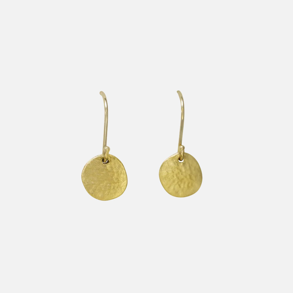 Complete your trendy and chic look with these stylish Small Sidewalk Disk Earrings. Made with high-quality materials, these earrings are the perfect accessory to elevate any outfit. Light and easy everyday charmers.  Handmade ear wires adorning a simple disk.  10mm disk.