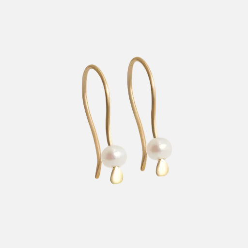 Tiny Pearl Earrings Light as a feather,  featuring a delicate and stylish design that adds a touch of sophistication to any outfit. These exquisite earrings are the perfect accessory for those seeking timeless beauty. Details  2 x 3mm Pearl Beads 14k Yellow Gold Each earring measures 4.75mm width by 4.1mm length